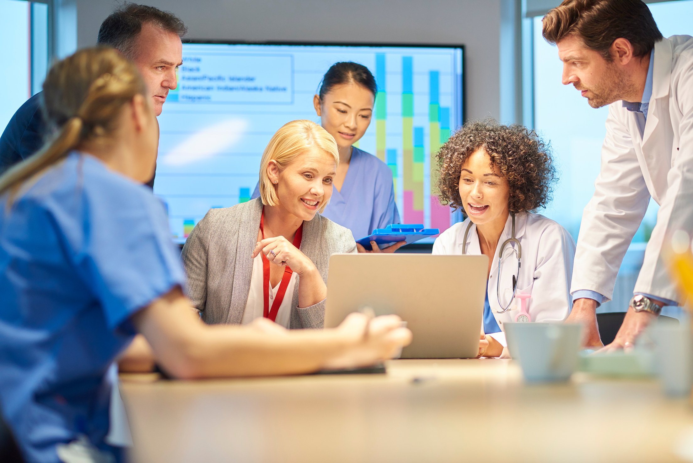 hospital team discussionbusiness rep with healthcare professionals